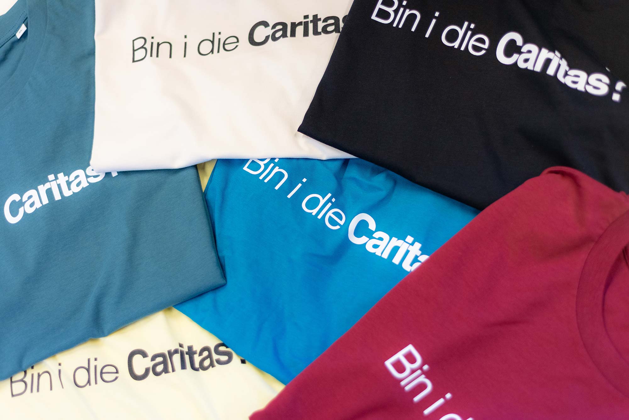 youngCaritas T-Shirts